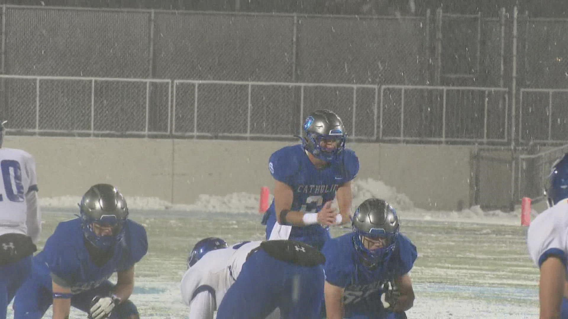 The Cougars survive the wild weather to win 25-6 and move on to the state semis.