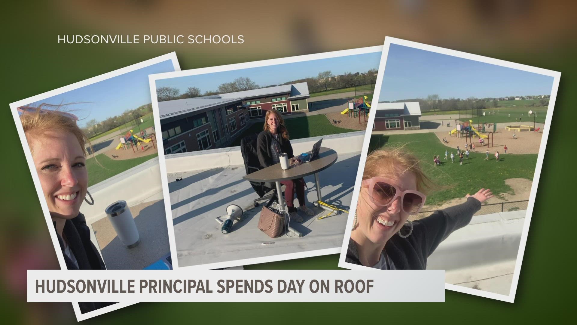 Principal MacKenzie Stefanich did her work from the roof to honor students and community members for helping out with the PTA's annual fundraiser.