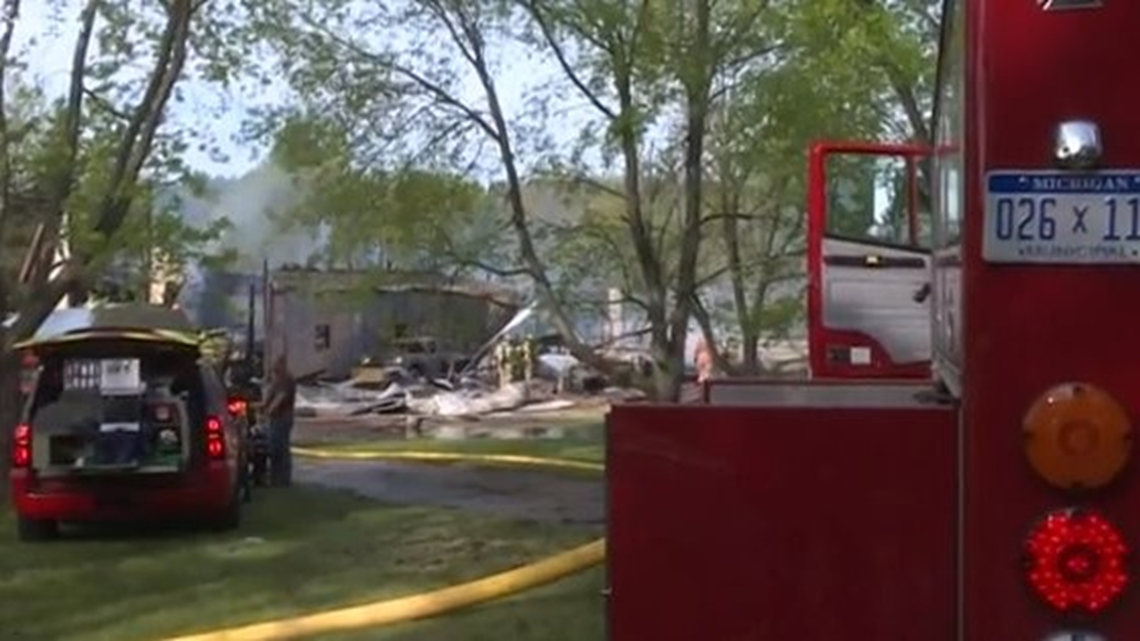 Multiple buildings involved in Algoma Township fire, police call it