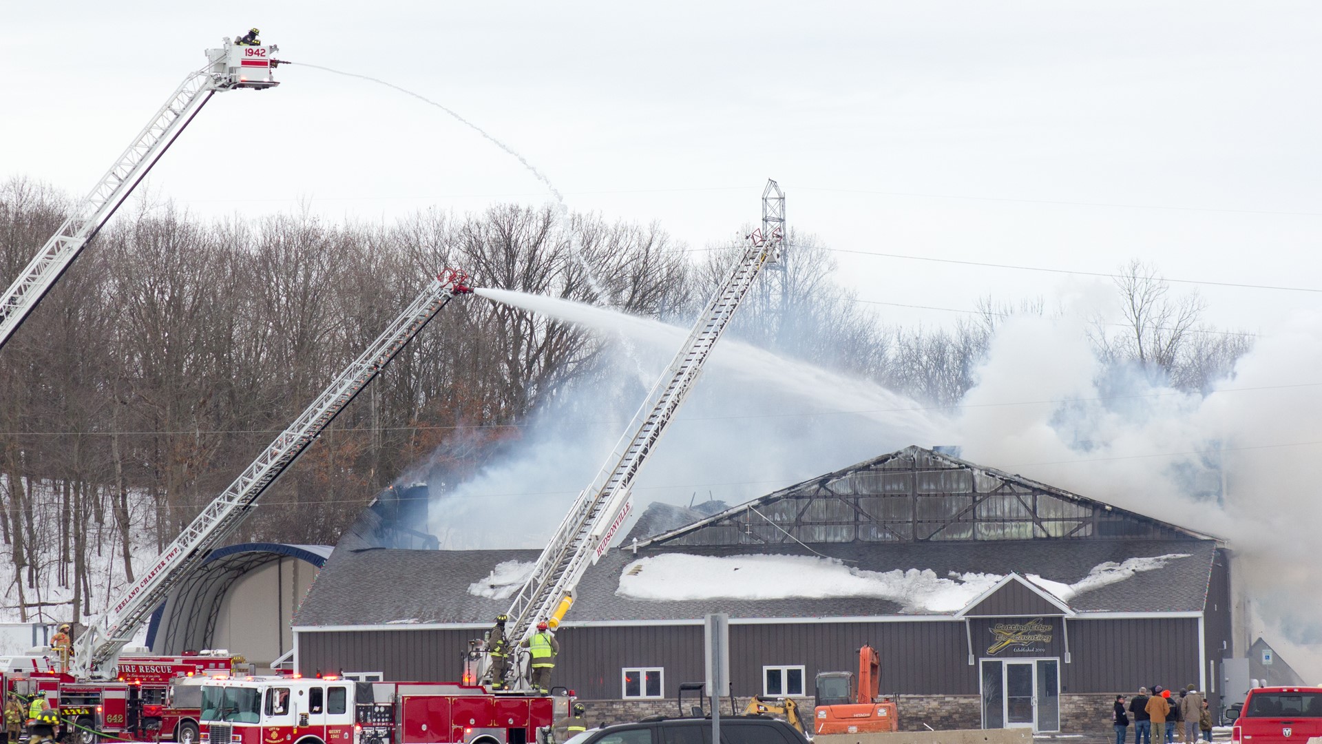 PHOTOS Multiple departments battle commercial fire in Zeeland Township