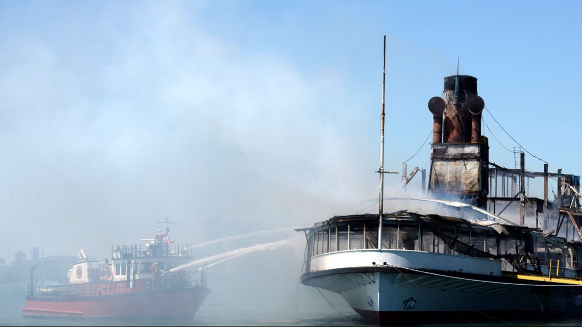 Members of the Detroit Fire Department Marine Corps spray water on the SS  Ste. Claire that was on fire at a marina in Detroit, on Friday, July, 6,  2018. The blaze on