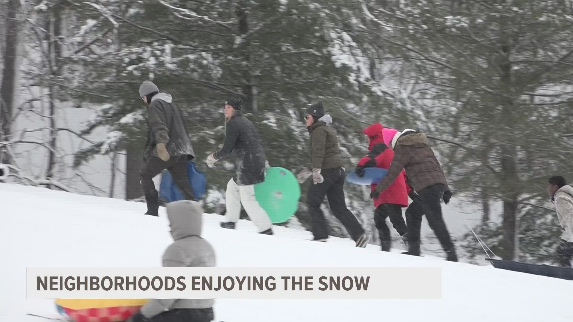 Even after the sun went down, children and families are still enjoying the first major snowfall of the winter in West Michigan Saturday evening.