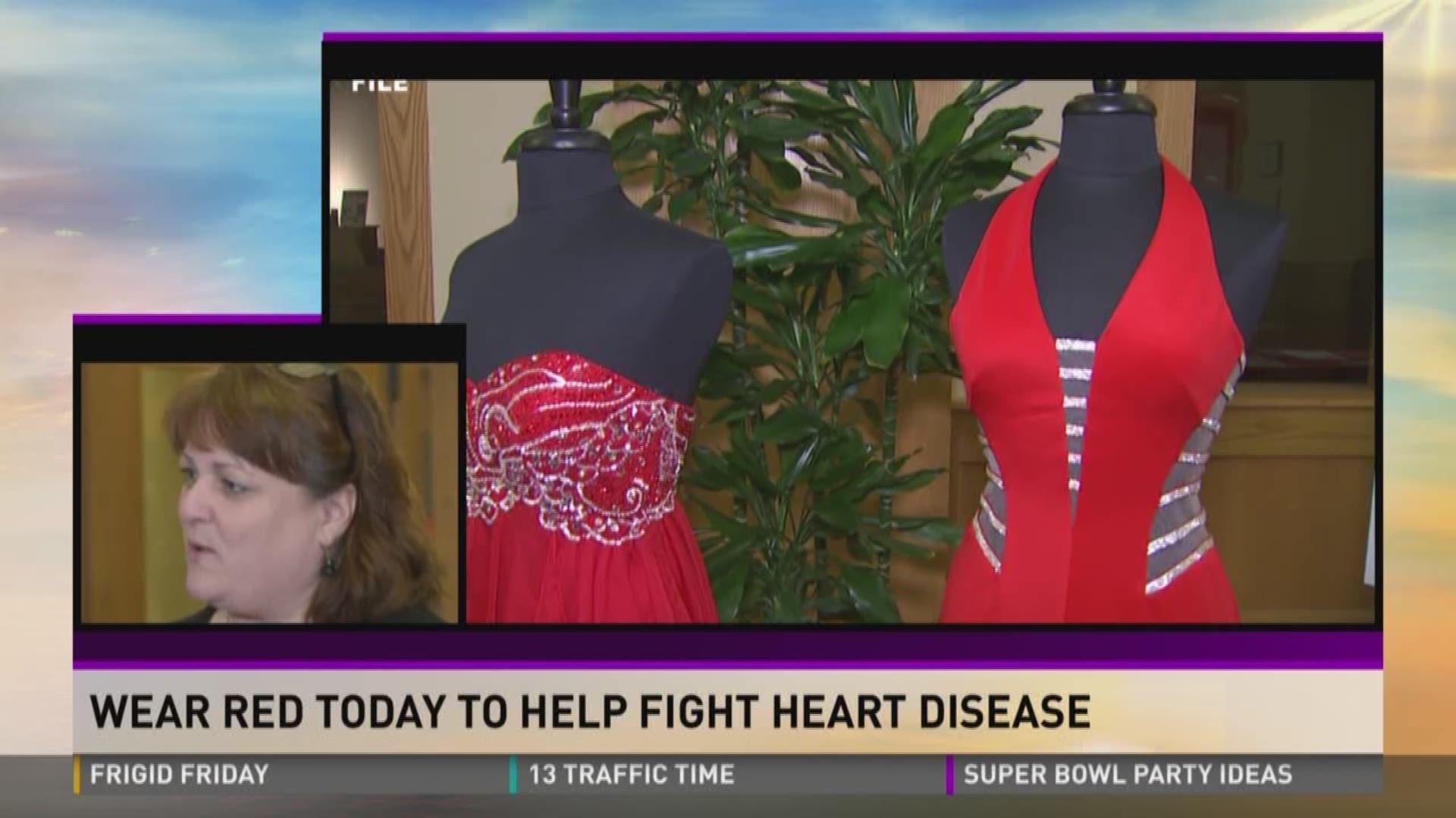 Angela Cunningham talks to organizers of "Go Red Day" as they work to raise awareness for cardiovascular disease, particularly in women.
