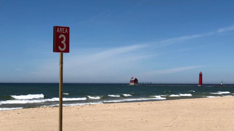 Grand Haven State Park closes water access after swimmers in distress rescued