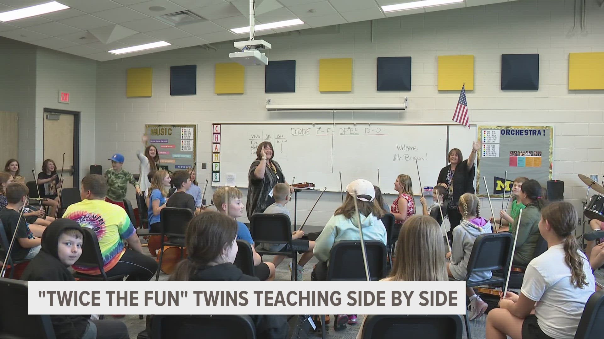 Becky Bush founded the Hudsonville Schools orchestra program in 2001, and now finds herself teaching side-by-side with her identical twin sister.