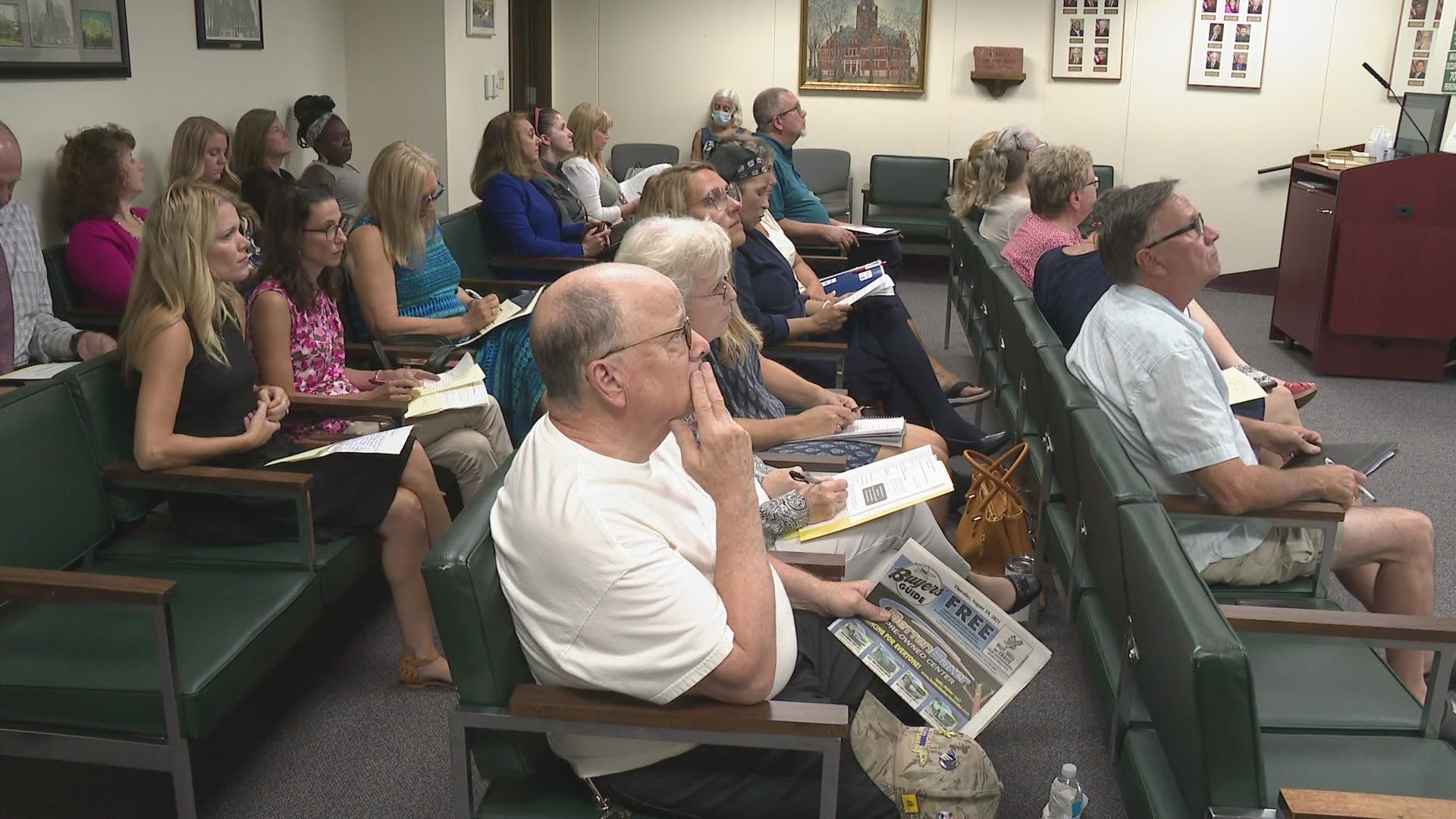 Parents who wanted to make their voices heard about masks and vaccines attended a Muskegon committee hearing.