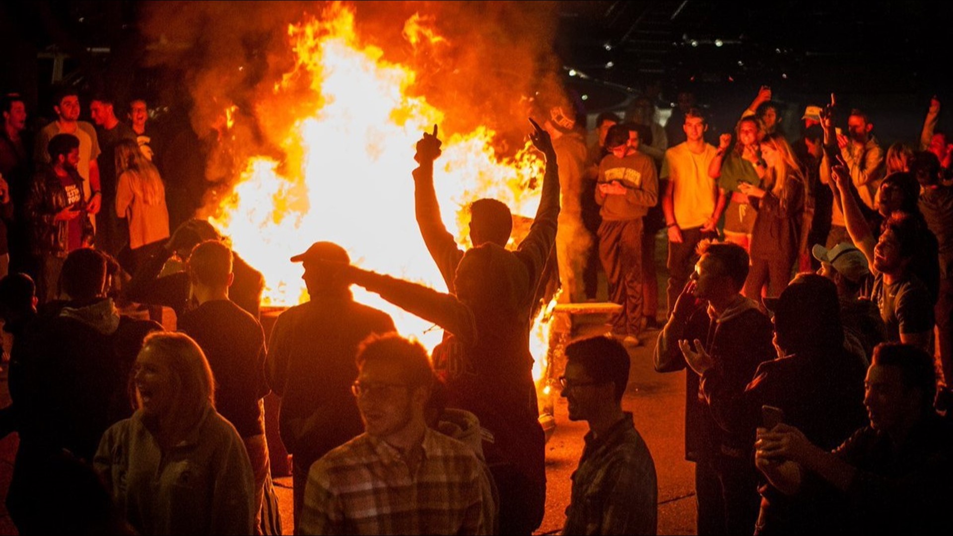 Michigan State fans burn couches, other things in Cedar Village after