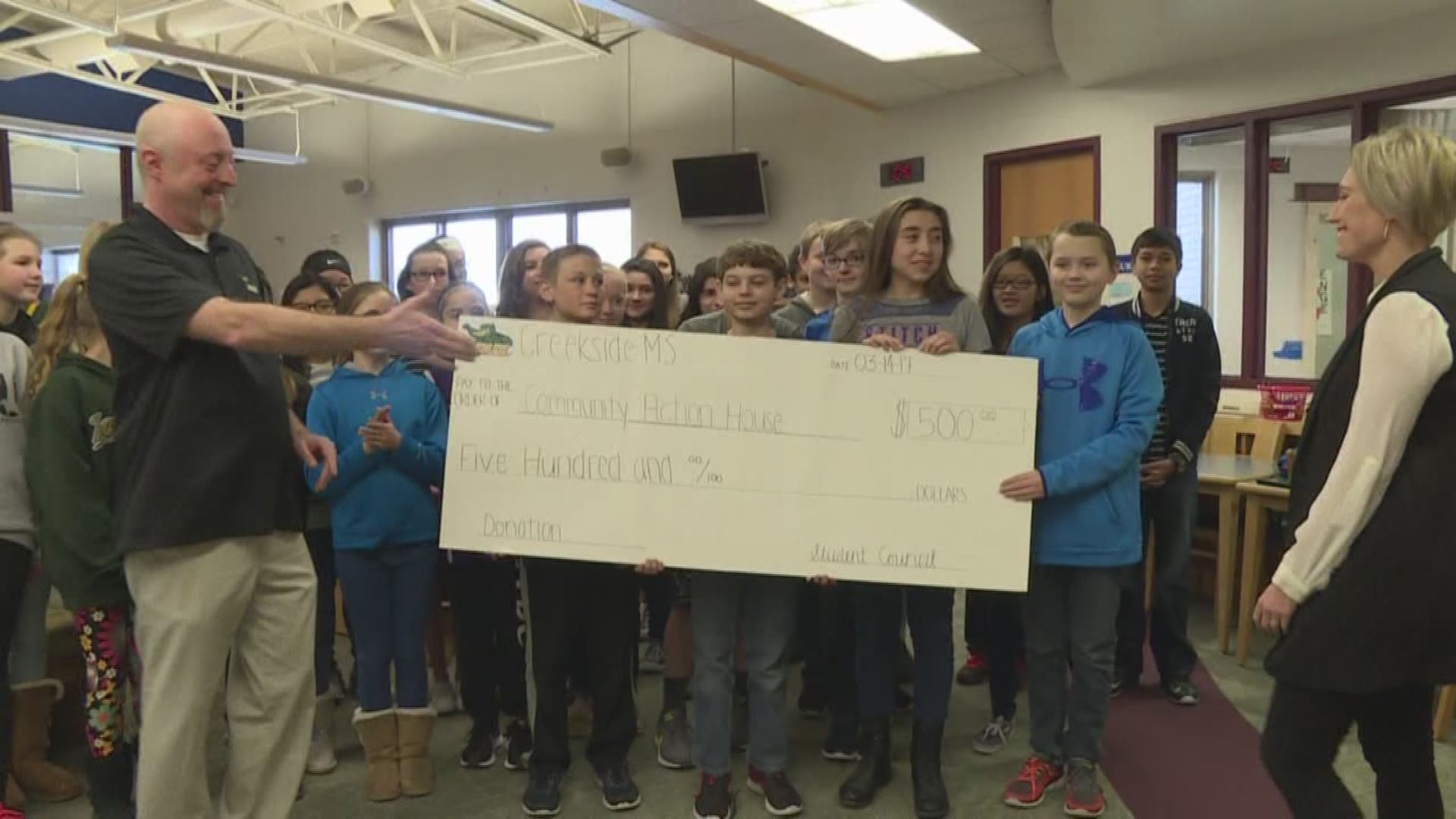 A Zeeland school that won a challenge to collect toys for area children is giving the money to other community causes