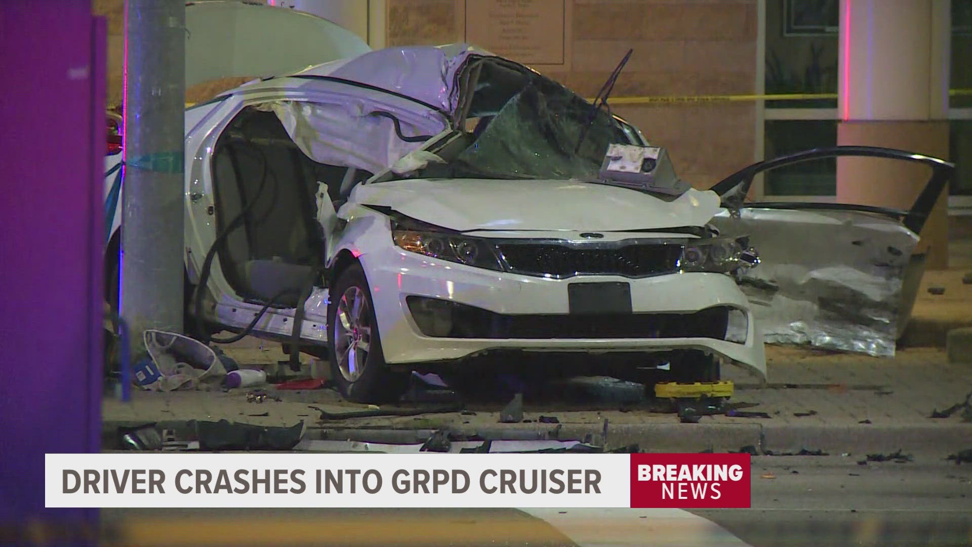 Three juveniles are accused of running a red light at the intersection and crashing into a police cruiser going through a green light.