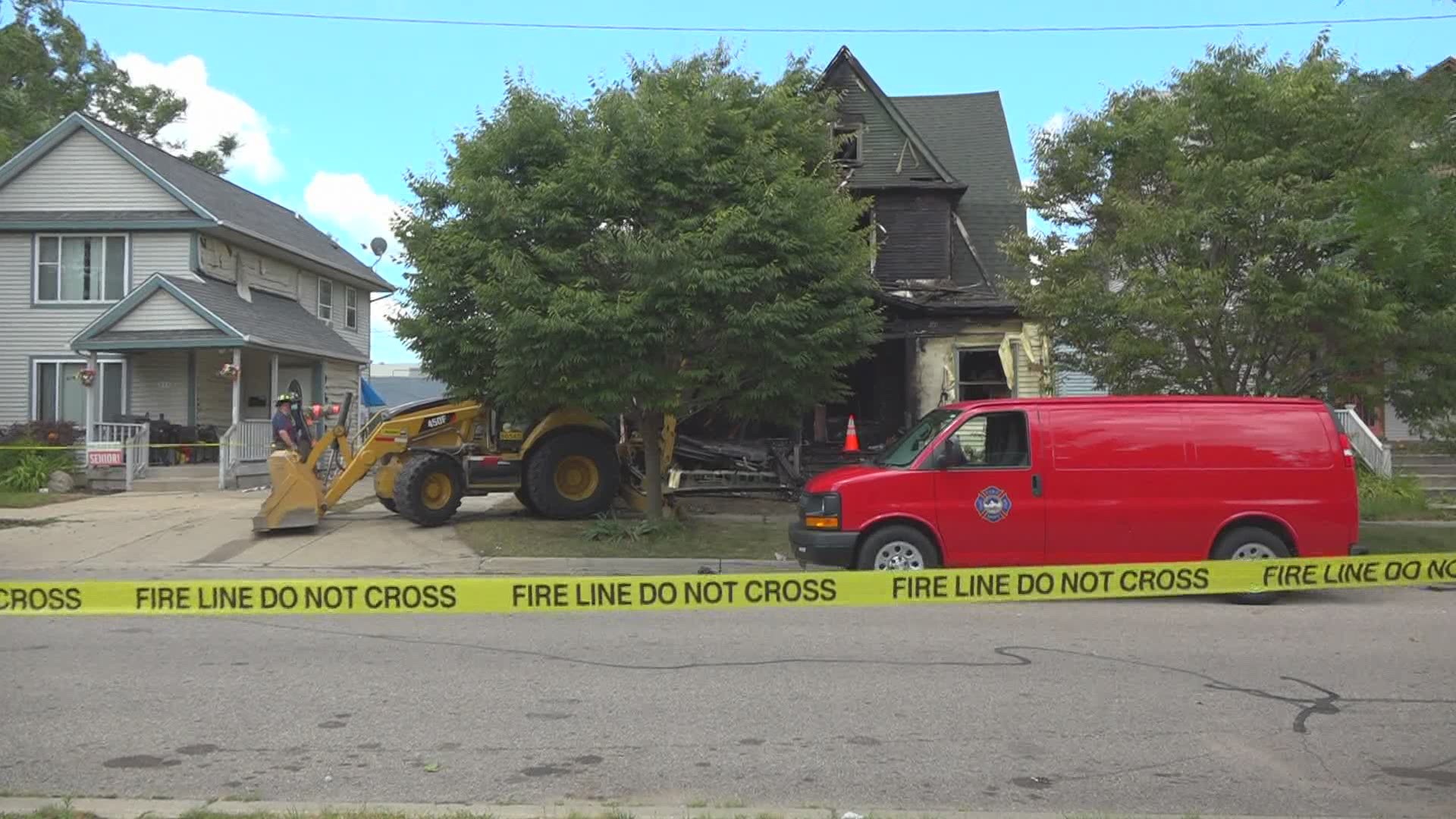 A woman and a child died in a fire early Saturday on the southeast side of Grand Rapids.