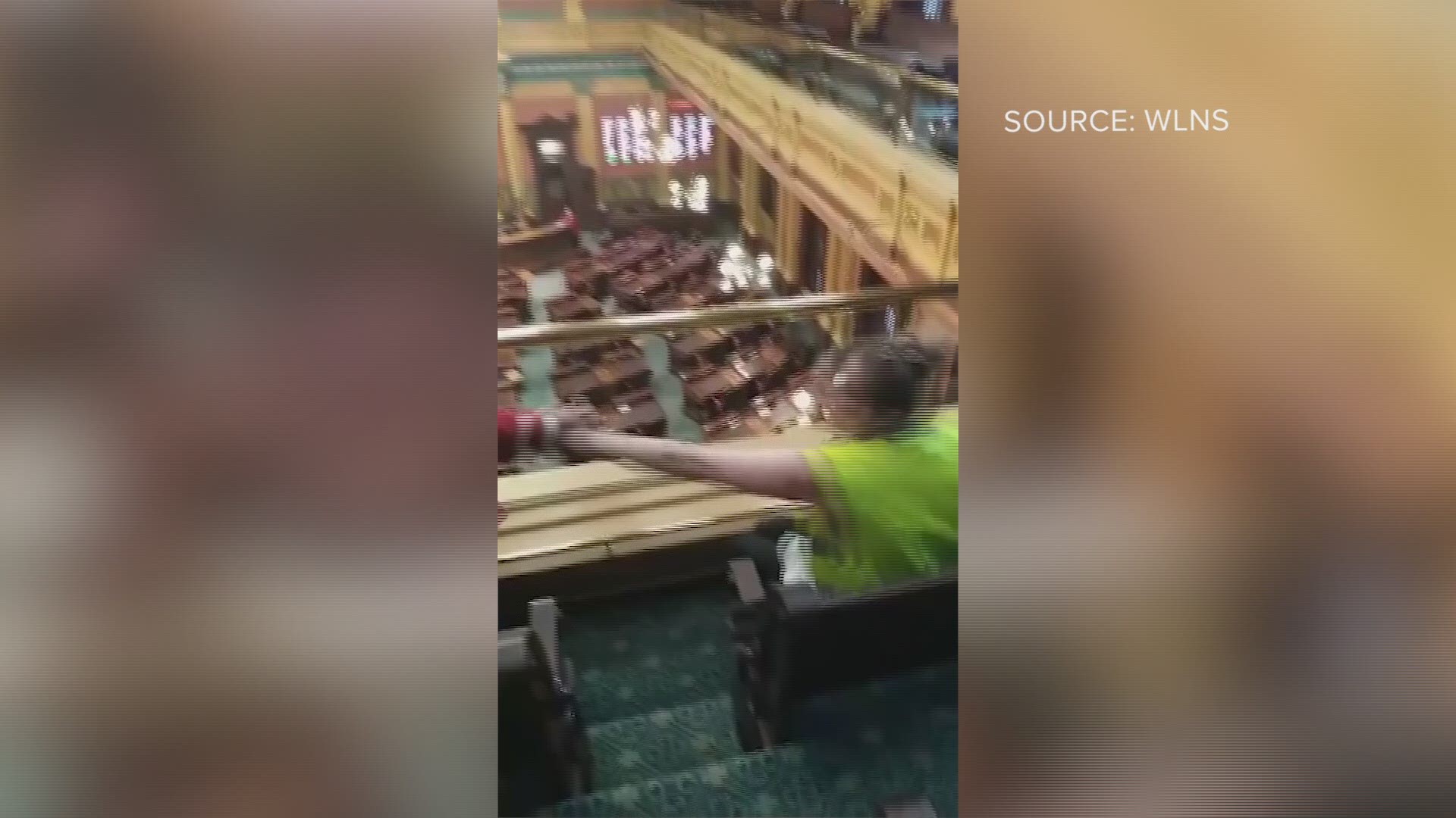 A small group of protesters chanted "Open Michigan now" from the gallery of the House of Representatives before being removed on Wednesday, according to WLNS.