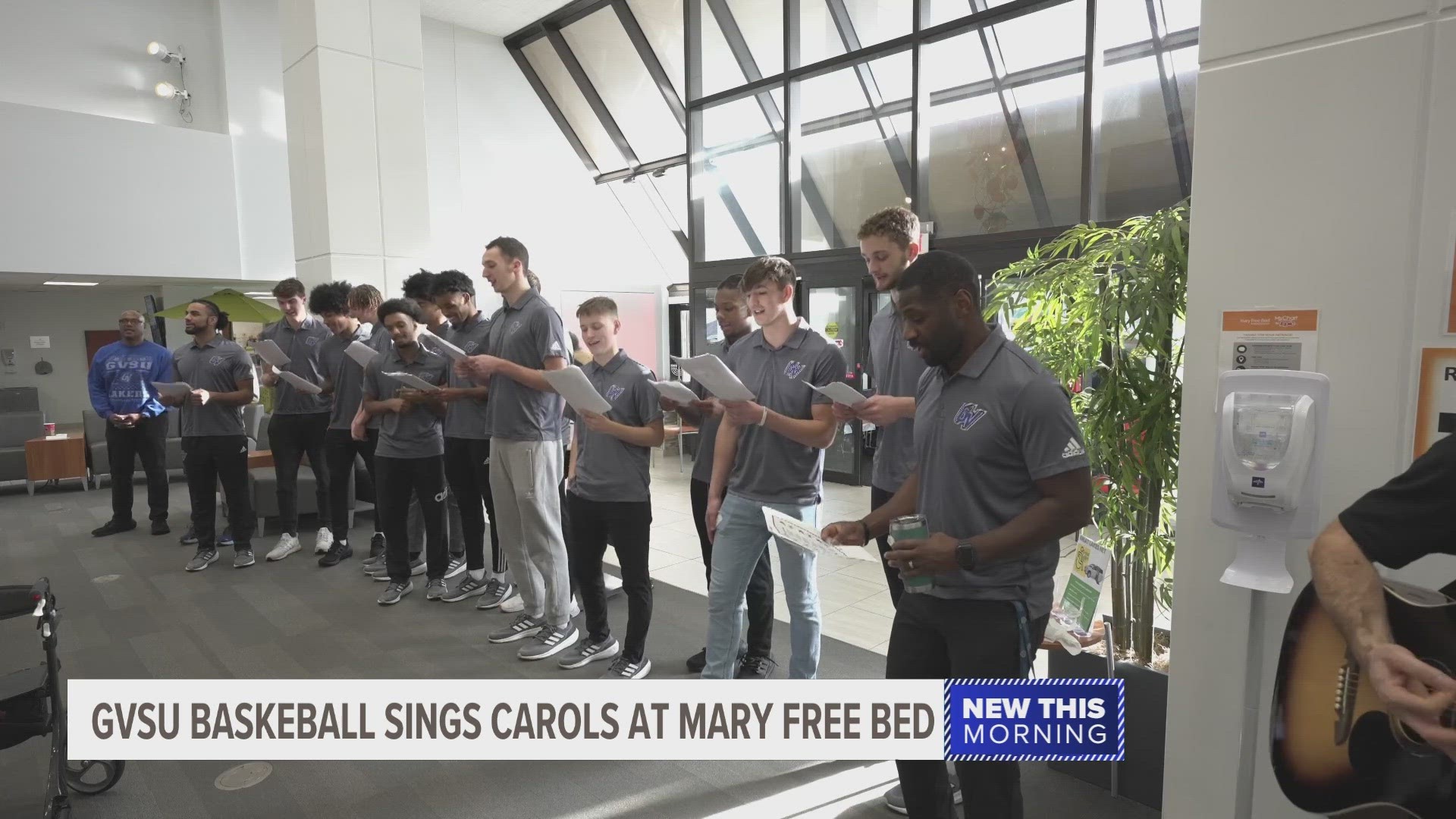 Friday, 15 players and coaches from the Grand Valley State University Men’s Basketball Team visited Mary Free Bed to sing carols for patients and staff.