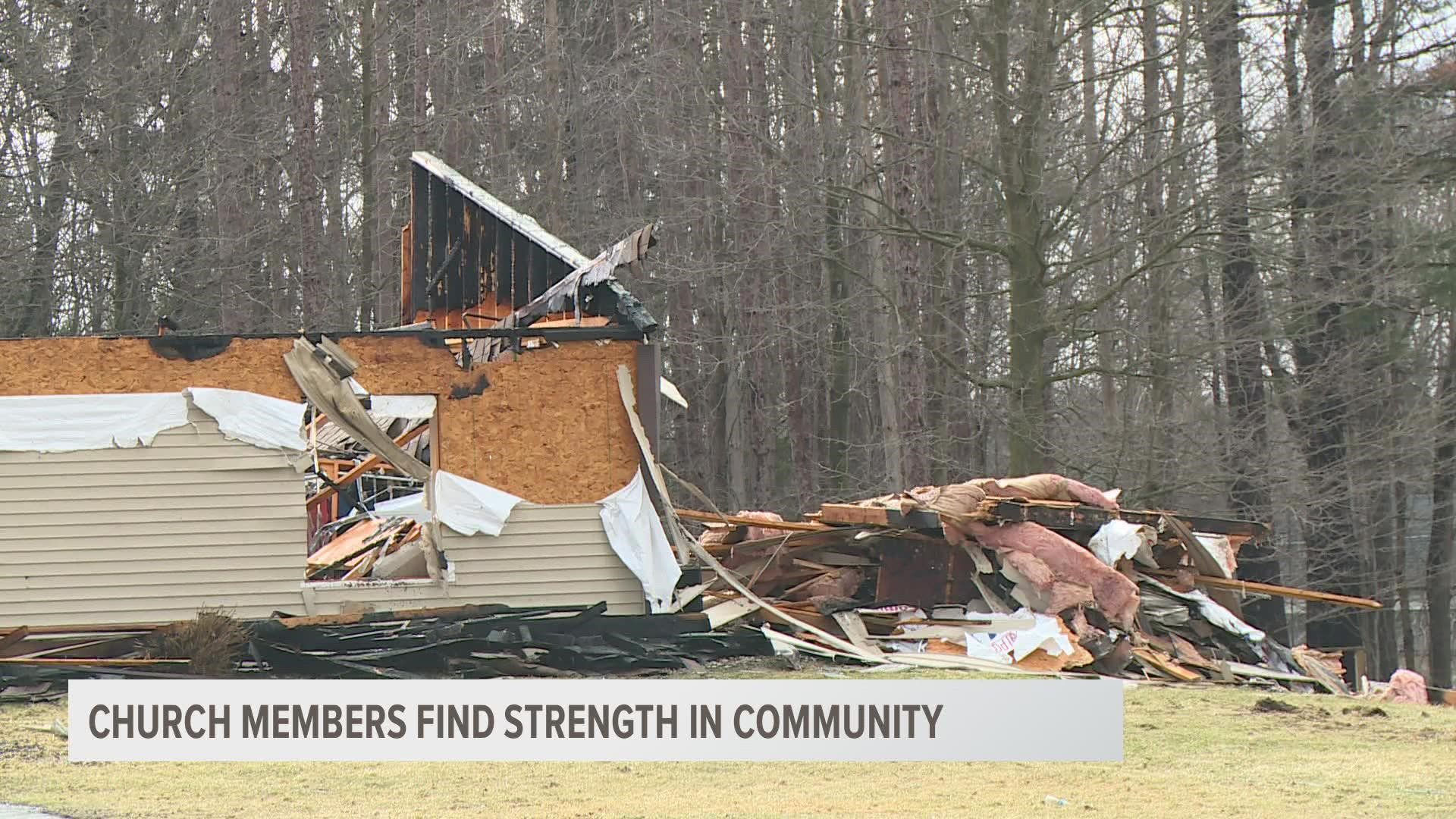 Flames raged for 16 hours, tearing down every structure in the First Reformed Church in Ravenna — everything but the church's cross.