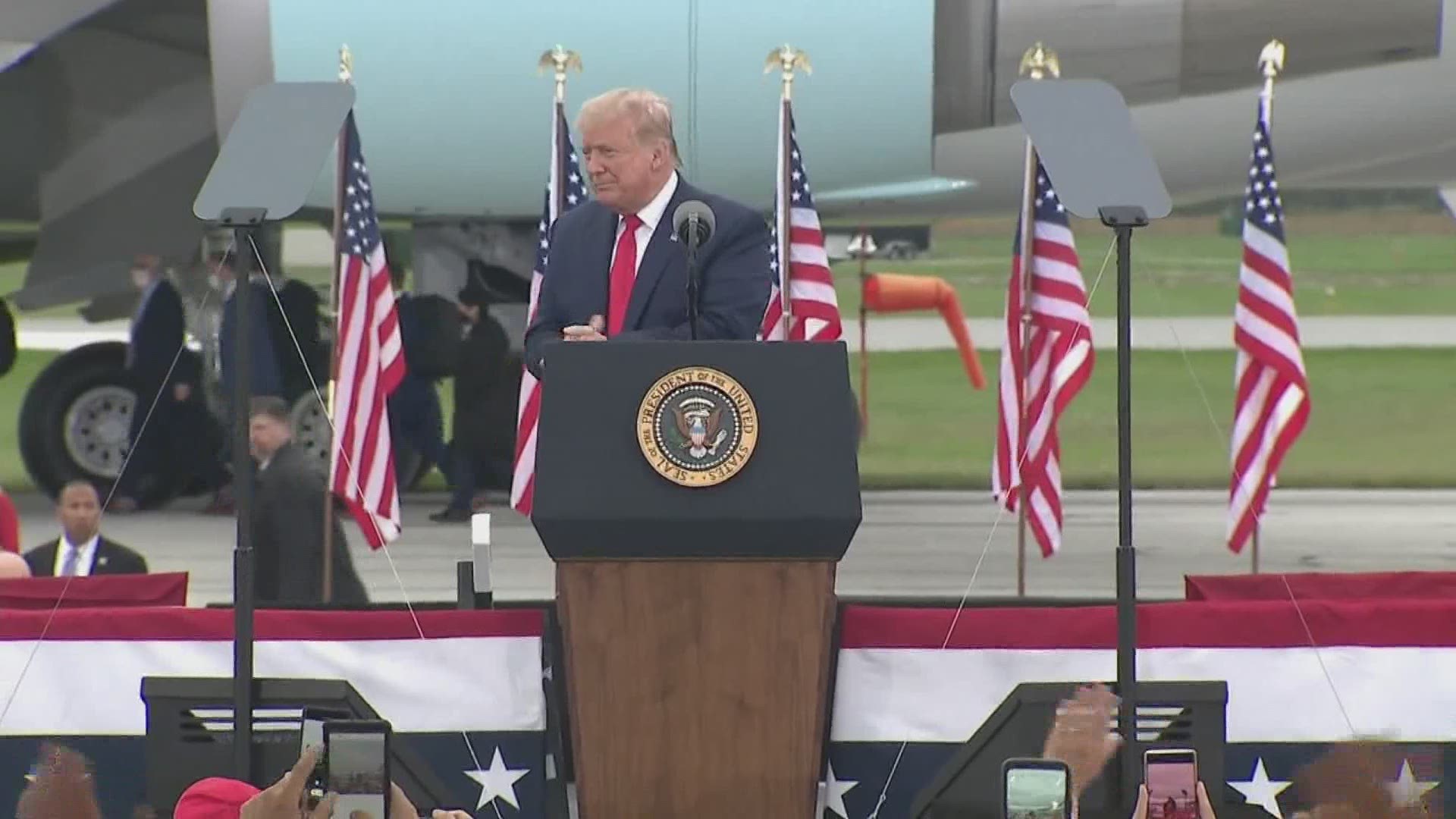 After stepping down from Air Force One, Trump reveled in the crowd of several thousand, packed shoulder-to-shoulder in an airport hangar, mostly without masks.