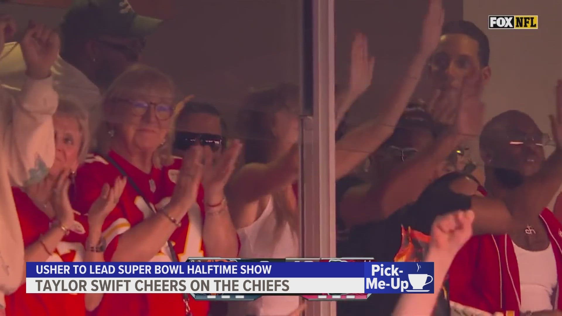 Taylor Swift and her dad cheer on Travis Kelce at Chiefs game