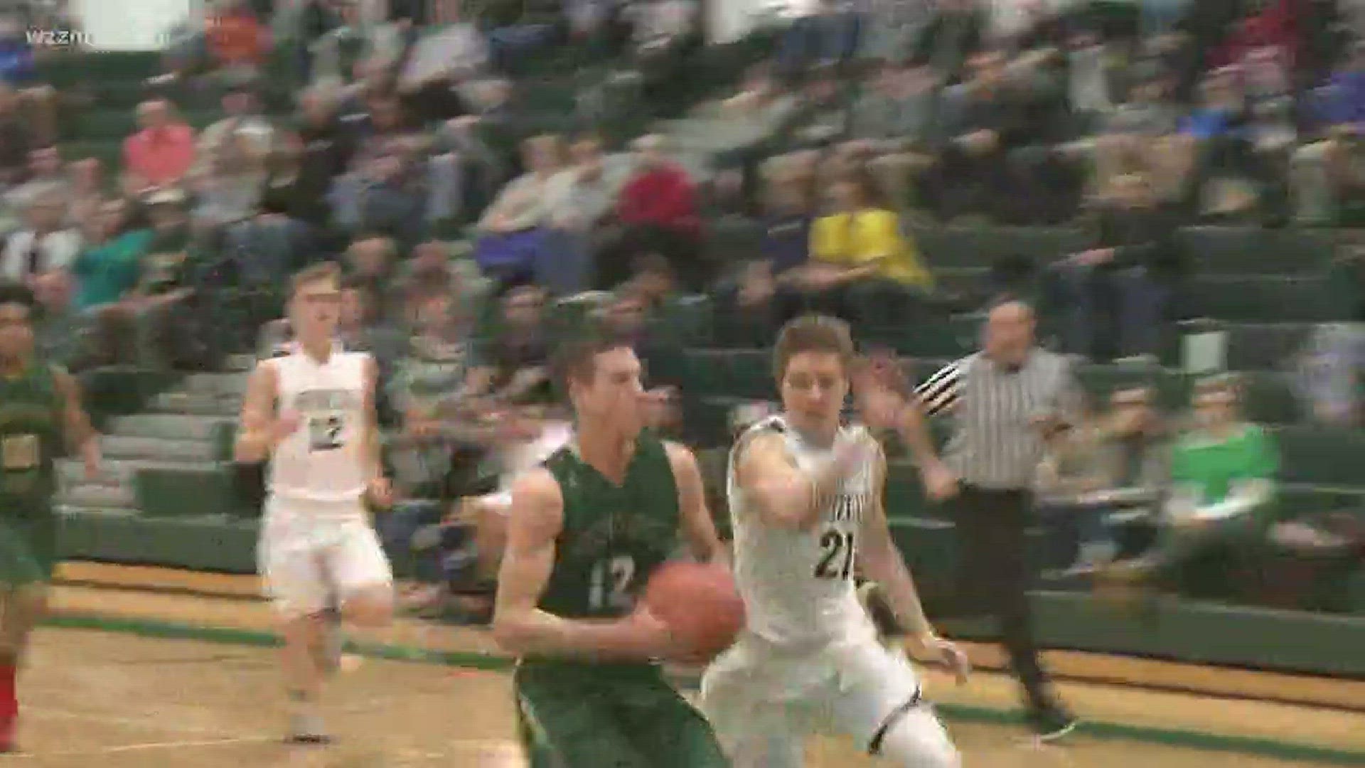 High school boys basketball districts: Coopersville vs. Comstock Park