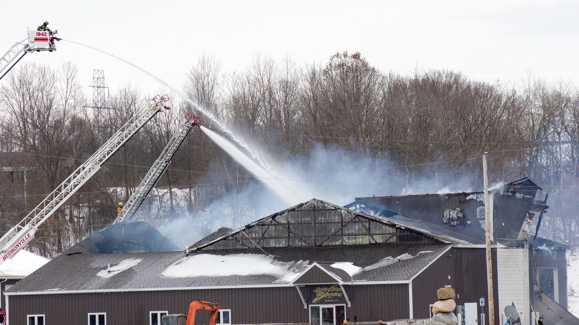 PHOTOS Multiple departments battle commercial fire in Zeeland Township