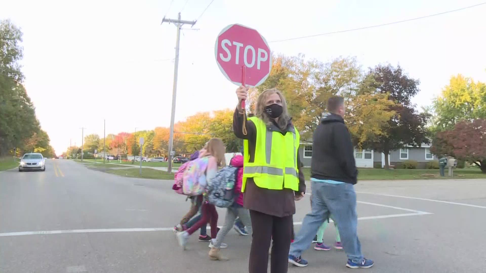 Susan Brisboe started as a crossing guard for West Ottawa's Woodside Elementary School in 1984. She retired after 36 years of leading little ones to safety.