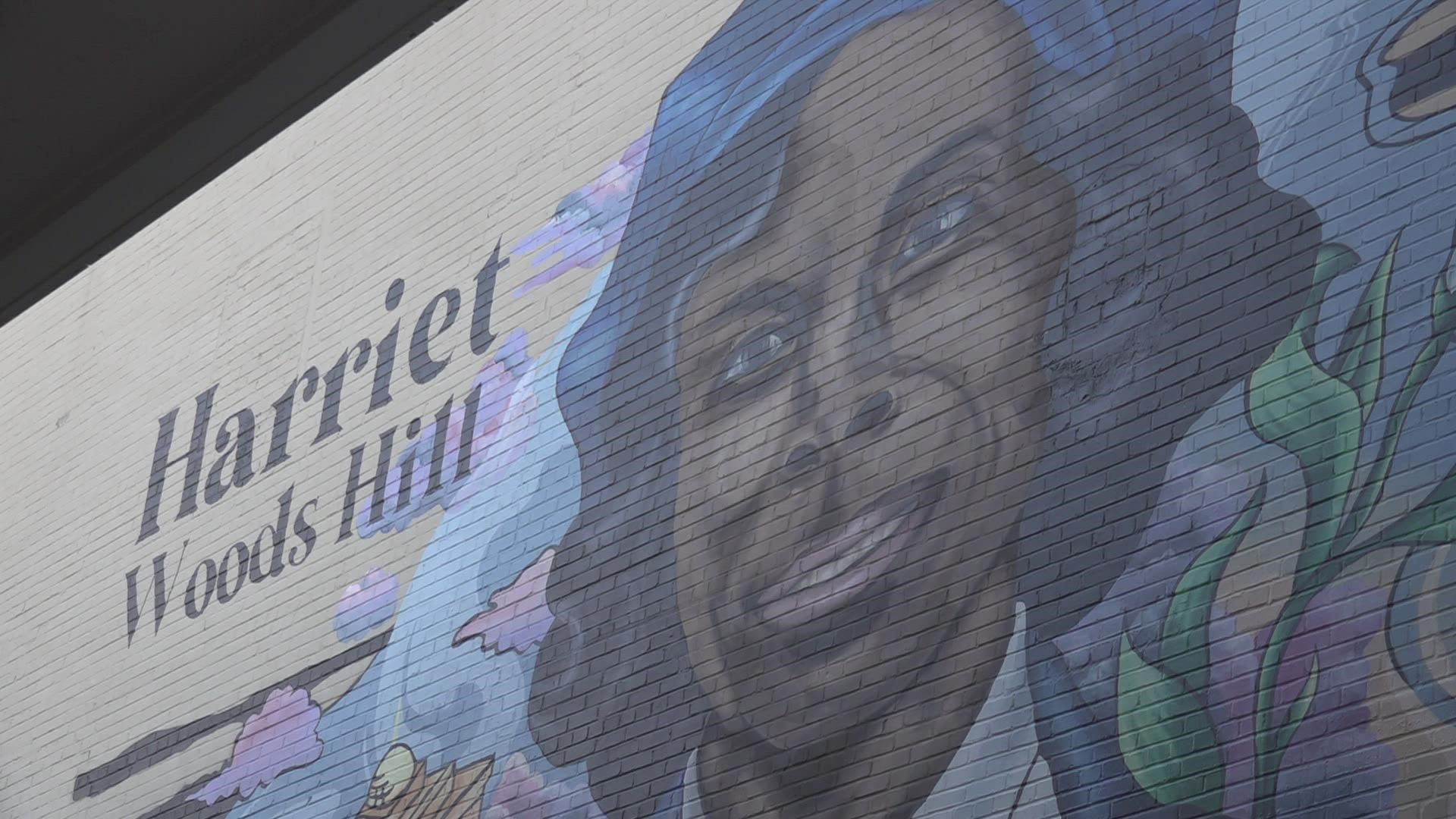 An alley next to GRPD headquarters has been renamed "Harriet Woods Hill Way" and it features a mural bearing her likeness.