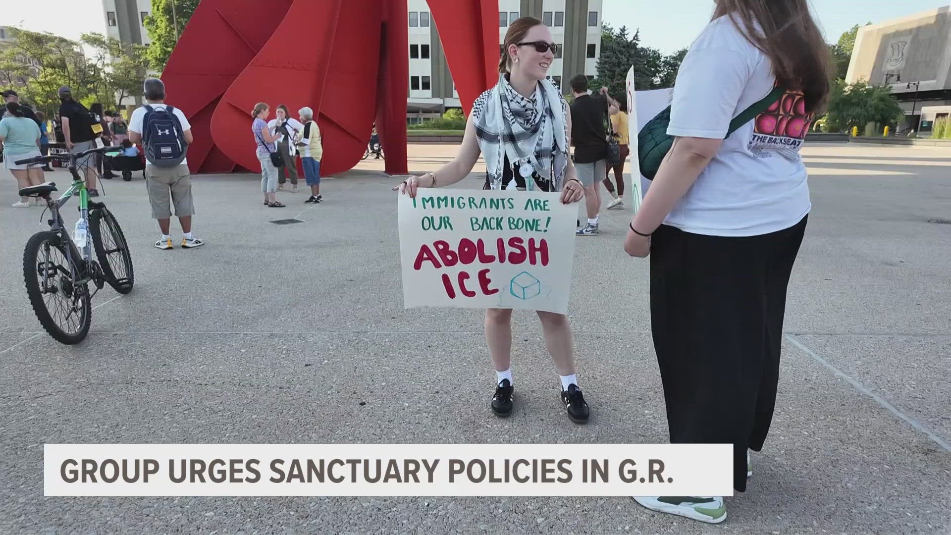 Protesters gathered in Grand Rapids to urge the city to adopt policies to prevent its police from working with ICE.