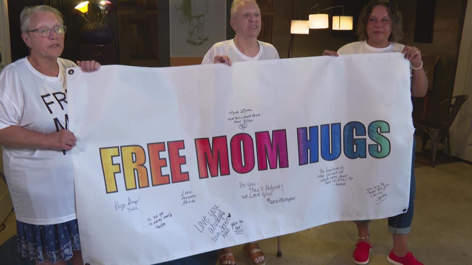 Moms in Muskegon are building up the community one free mom hug at a time.