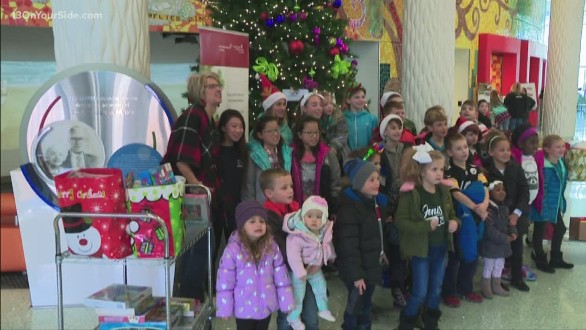 A group of Jenison elementary school kids helped spread some holiday cheer on Friday.