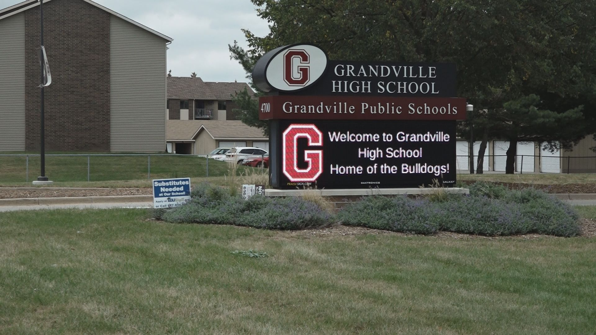 Grandville Public Schools informed parents Wednesday of two threats discovered at the school, one using racial slurs and the other referring to a shooting Friday.