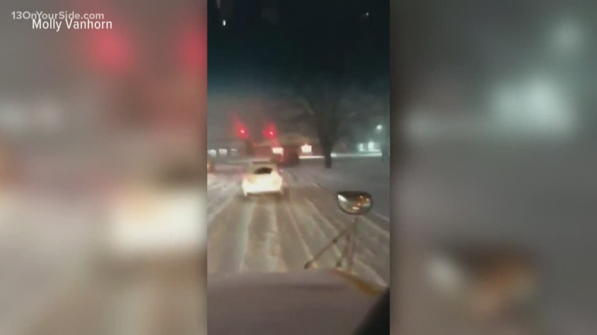 The wrestling team pushed a car out of the snow at 5:30 a.m. on Saturday.