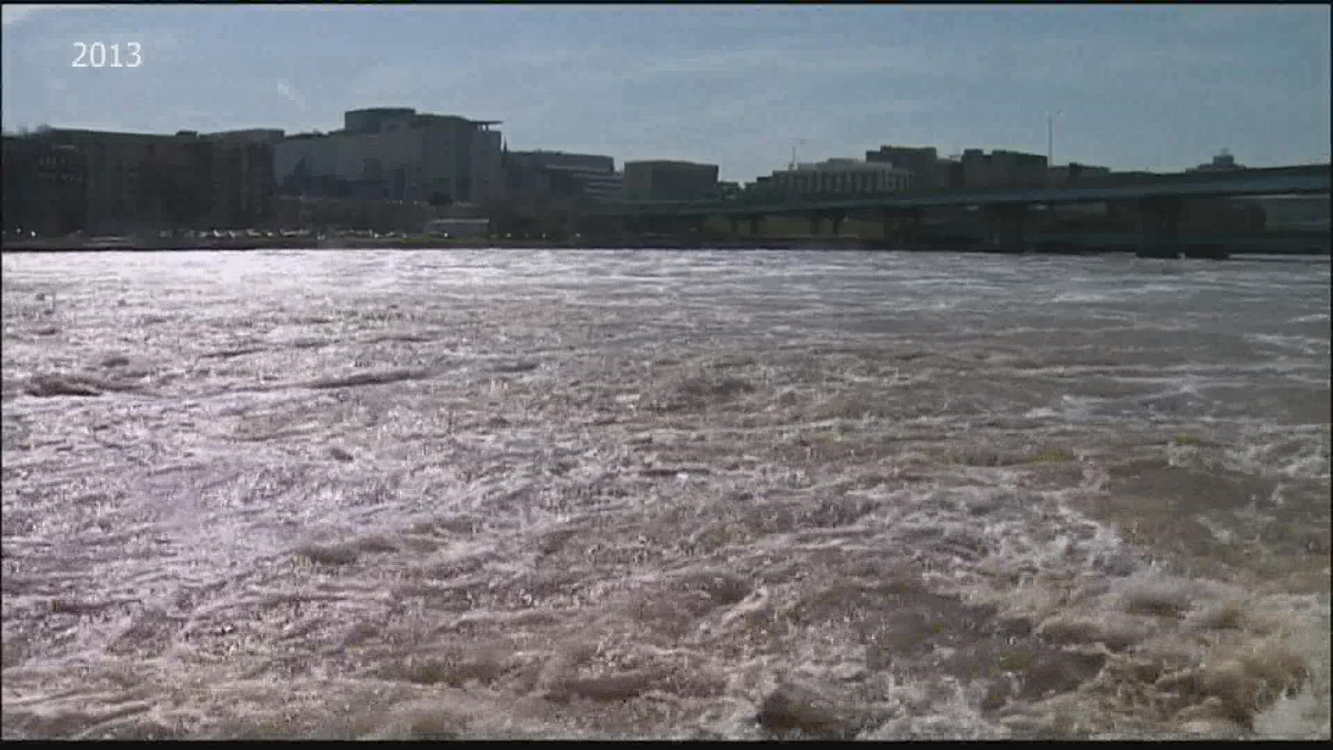 A lawsuit claimed that changes the city made to a Grand River floodwall to allow increased pedestrian access led to a building flooding and closing for 17 days.