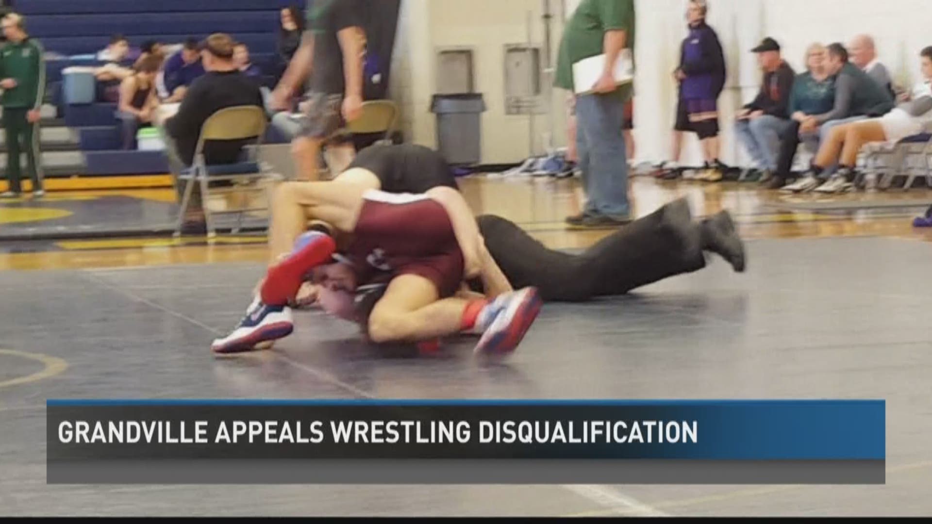 The school was disqualified for participating in one too many wrestling meets.