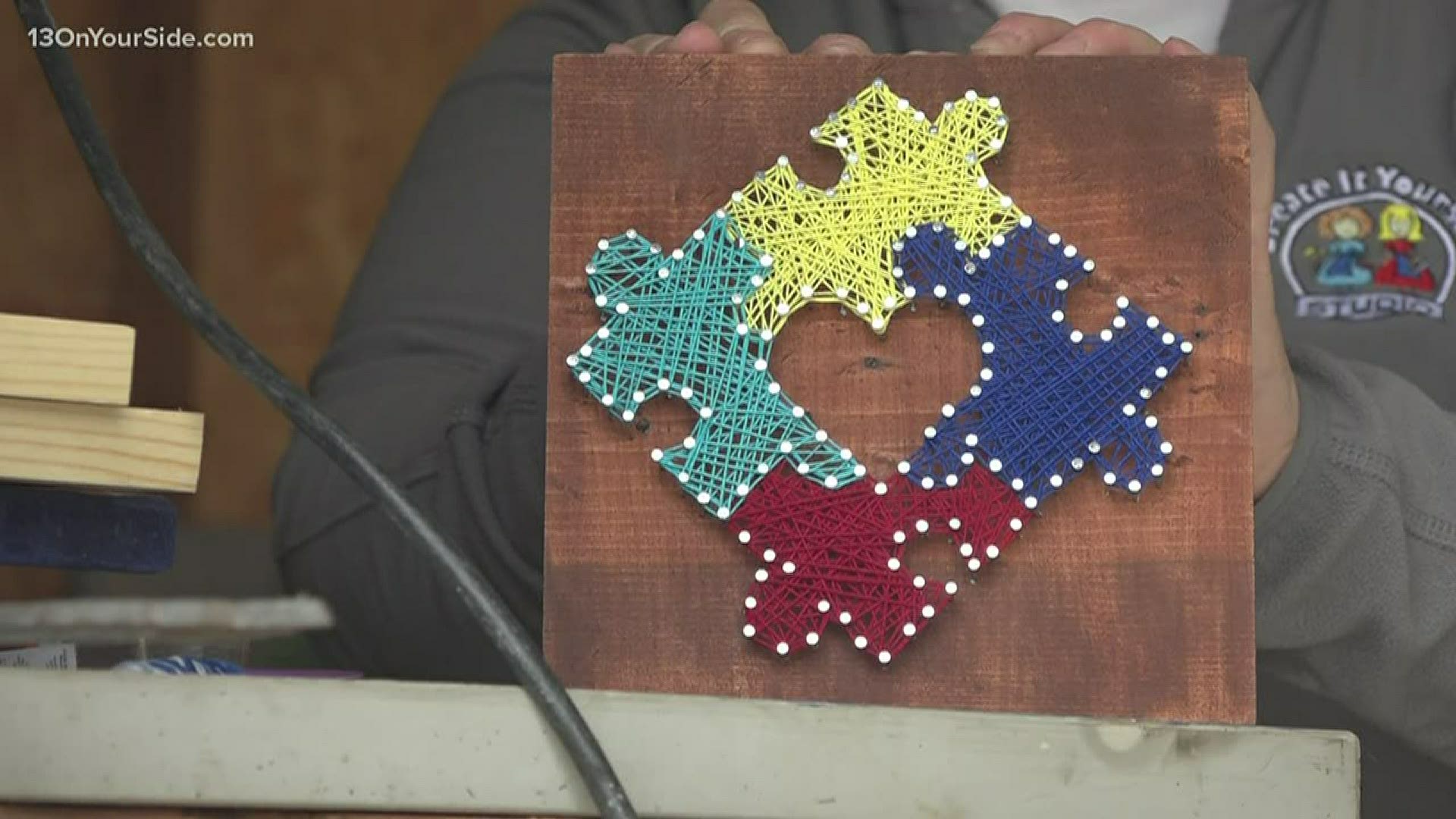 One Ottawa County artist decided to give back to an organization that supports people and families that deal with autism