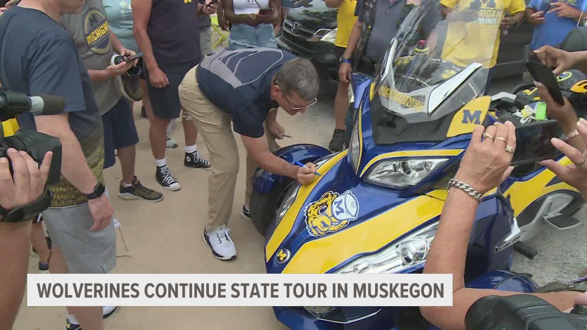 The football team took a stop in Grand Rapids on Friday, and today they take Muskegon on their summer tour across the state.