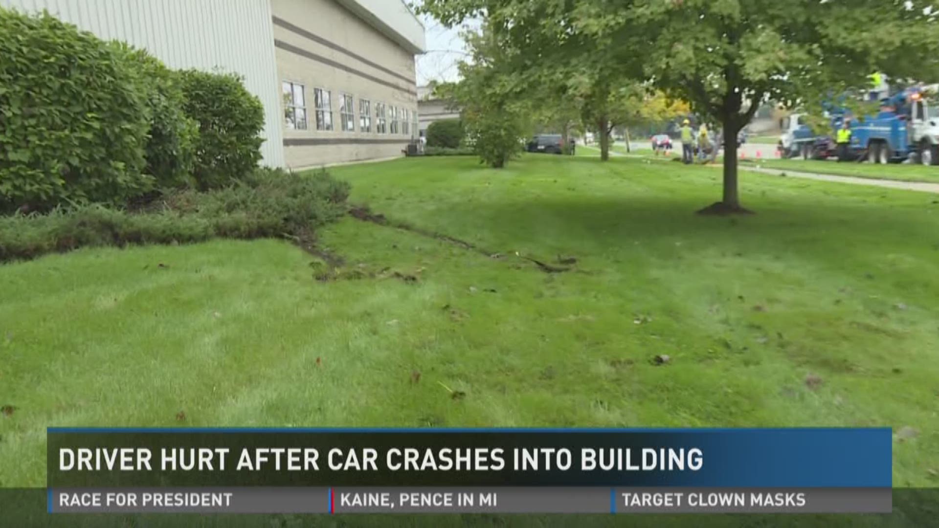 A driver who crashed into a building in Walker this morning is hospitalized.