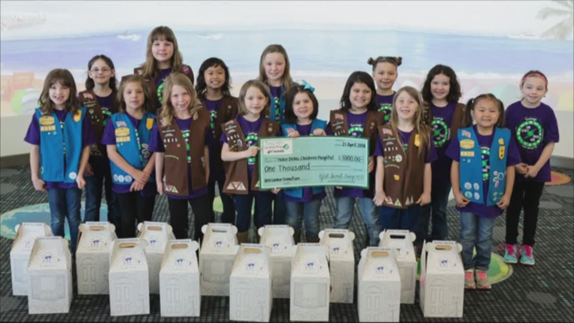 Girl Scouts donate cookie money