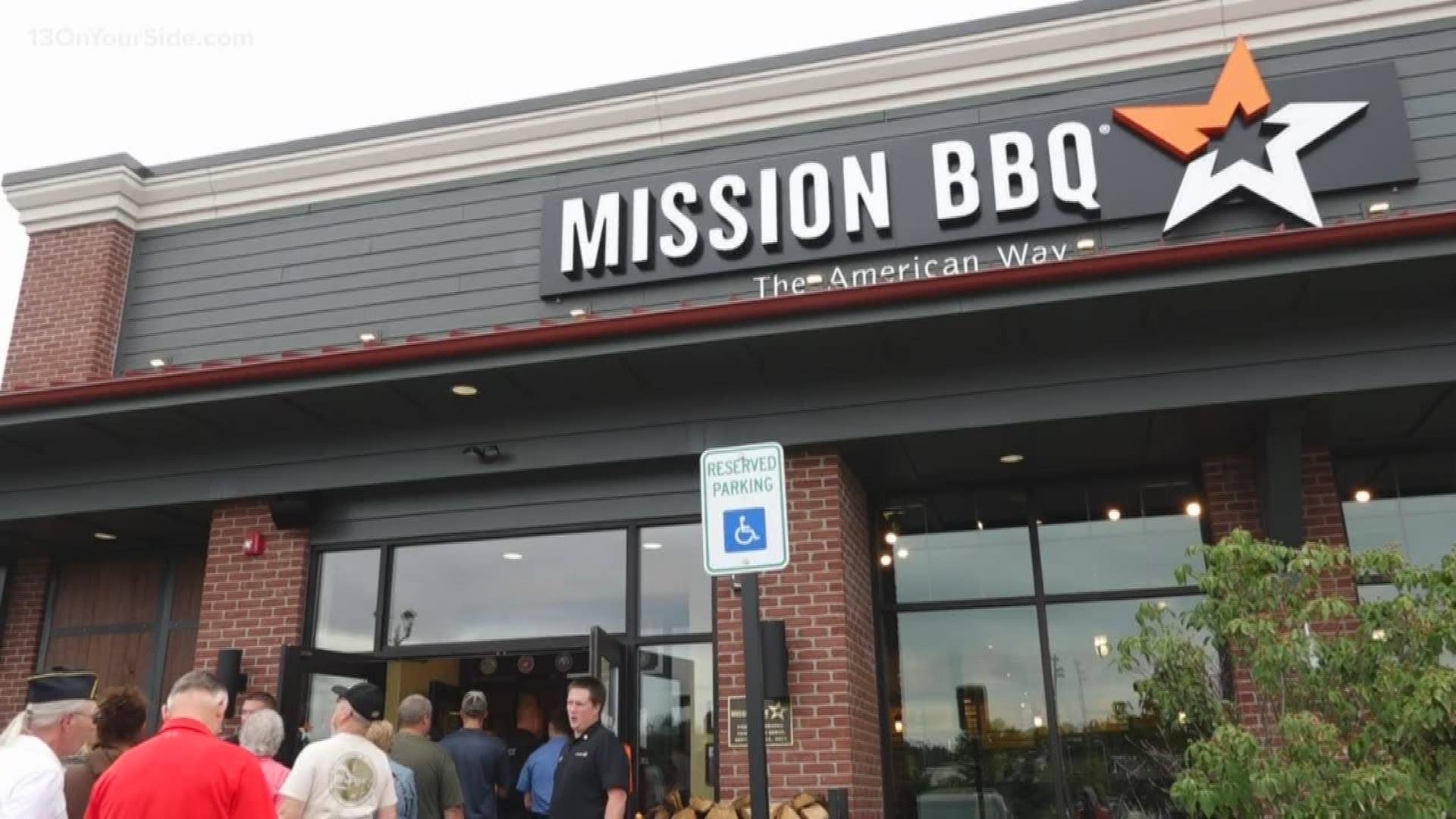 The newest barbecue eatery in Grand Rapids celebrated today's opening as they do at all of their locations -- with a live version of the national anthem.