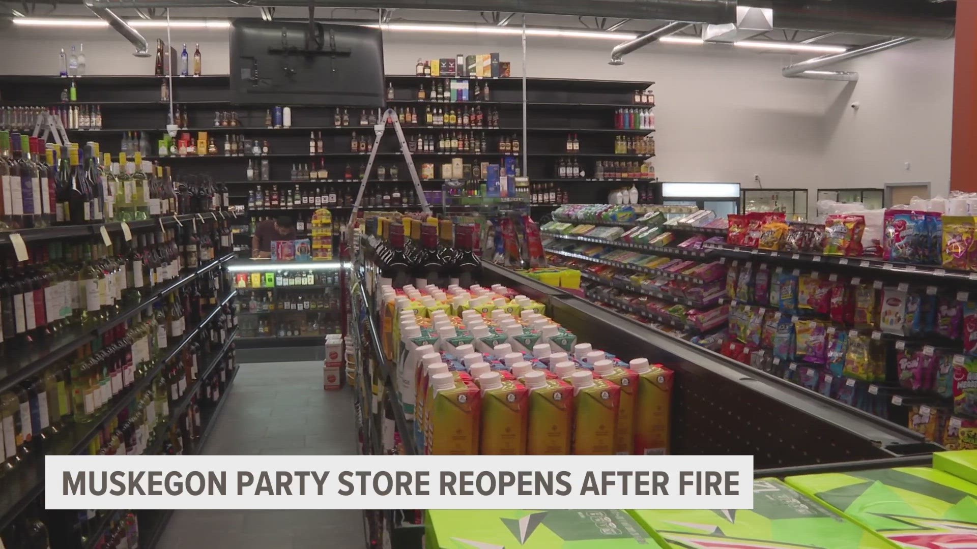 After burning to the ground more than a year ago a West Michigan party store has reopened.