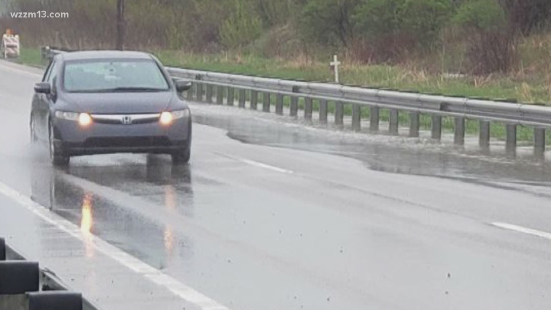 Authorities say drivers should slow down and never drive through a flooded roadway.