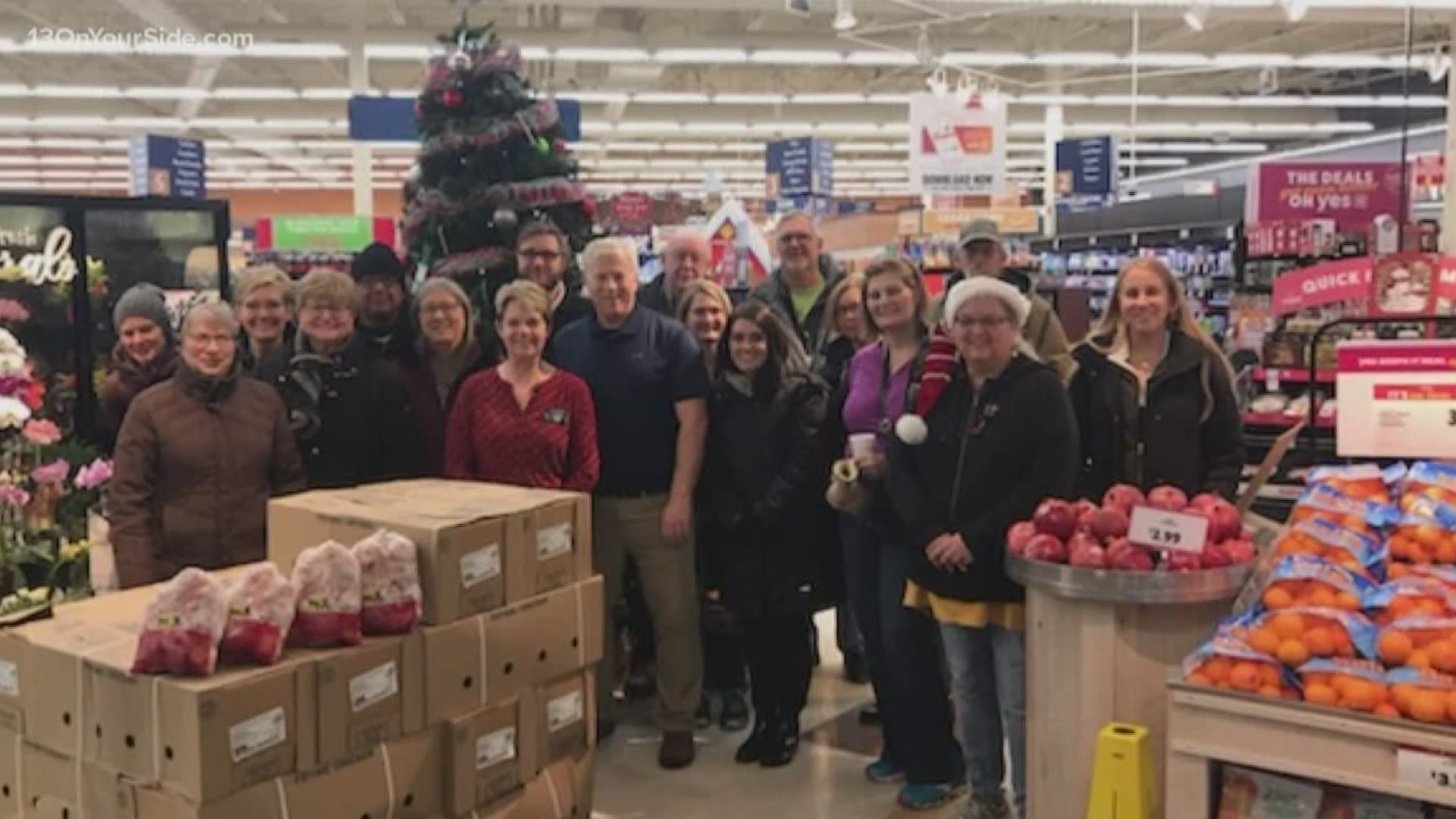 SpartanNash and Miller Poultry made a chicken donation at the Metro Family Fare in Wyoming.
