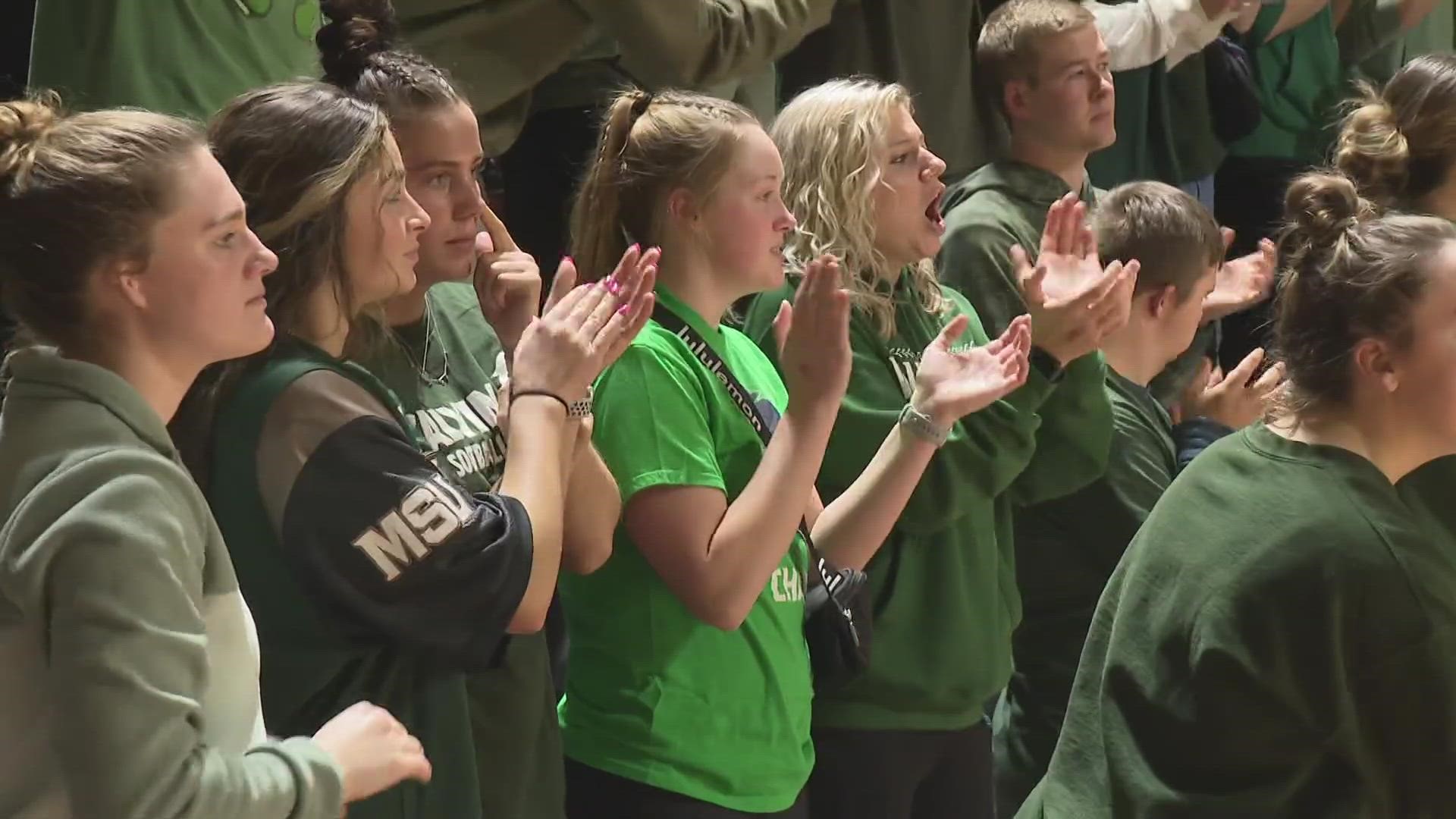 Both teams paid their respects to Michigan State by wearing special warm-up shirts.