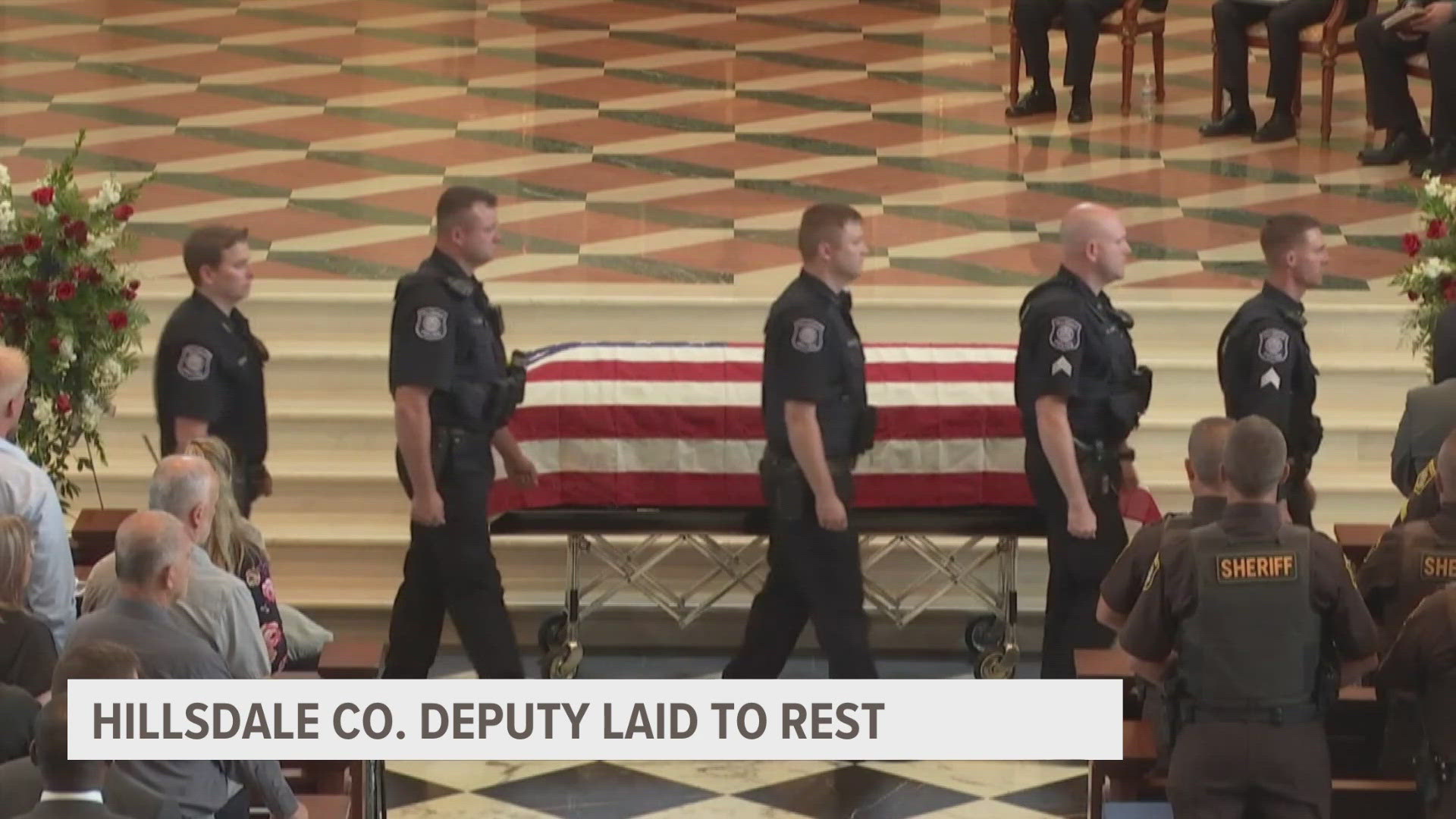 Deputy Butler's wife and five children were surrounded by friends, family and law enforcement officers as they laid him to rest Wednesday morning.