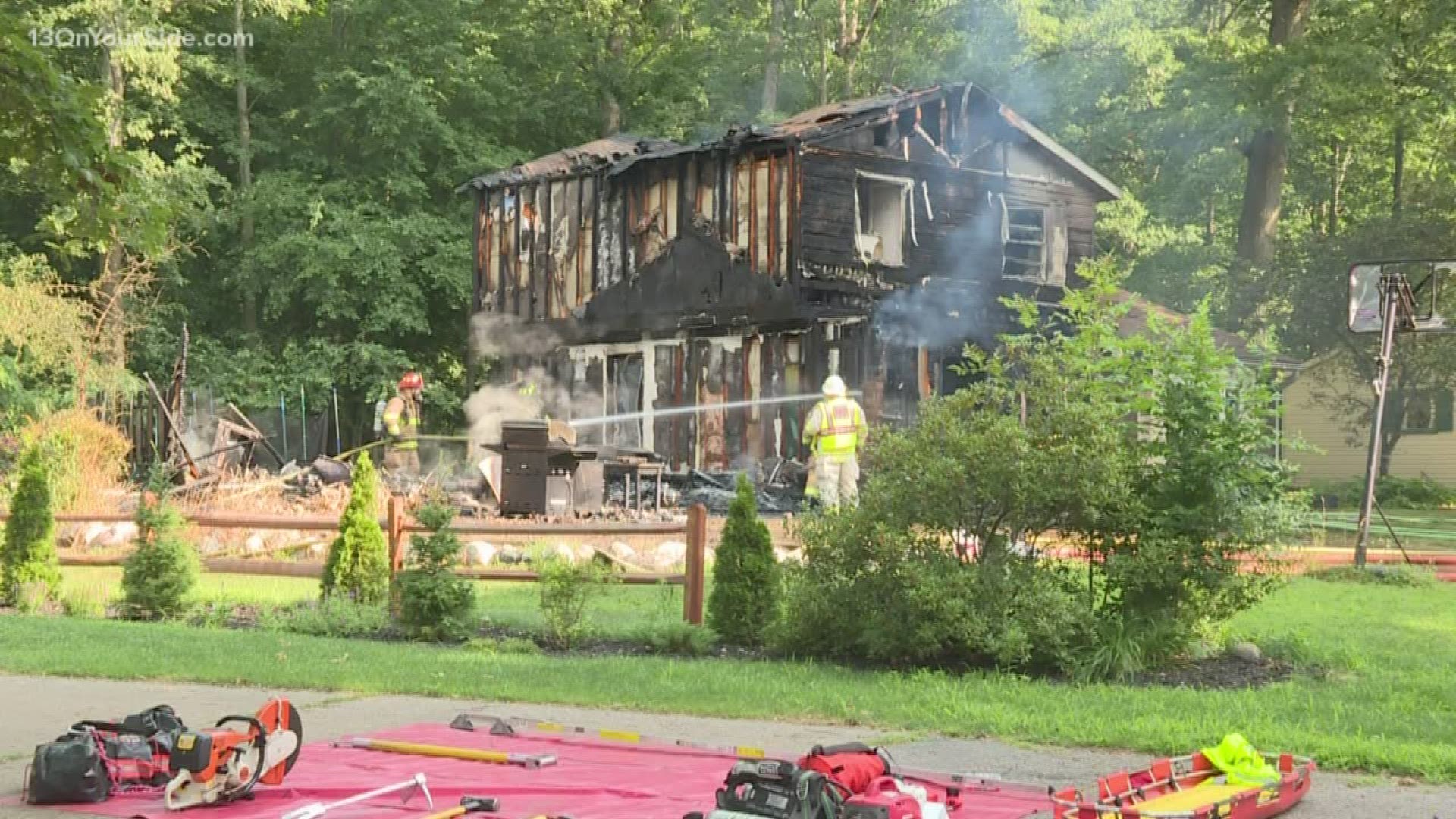 Three children escape safely from Hudsonville house fire