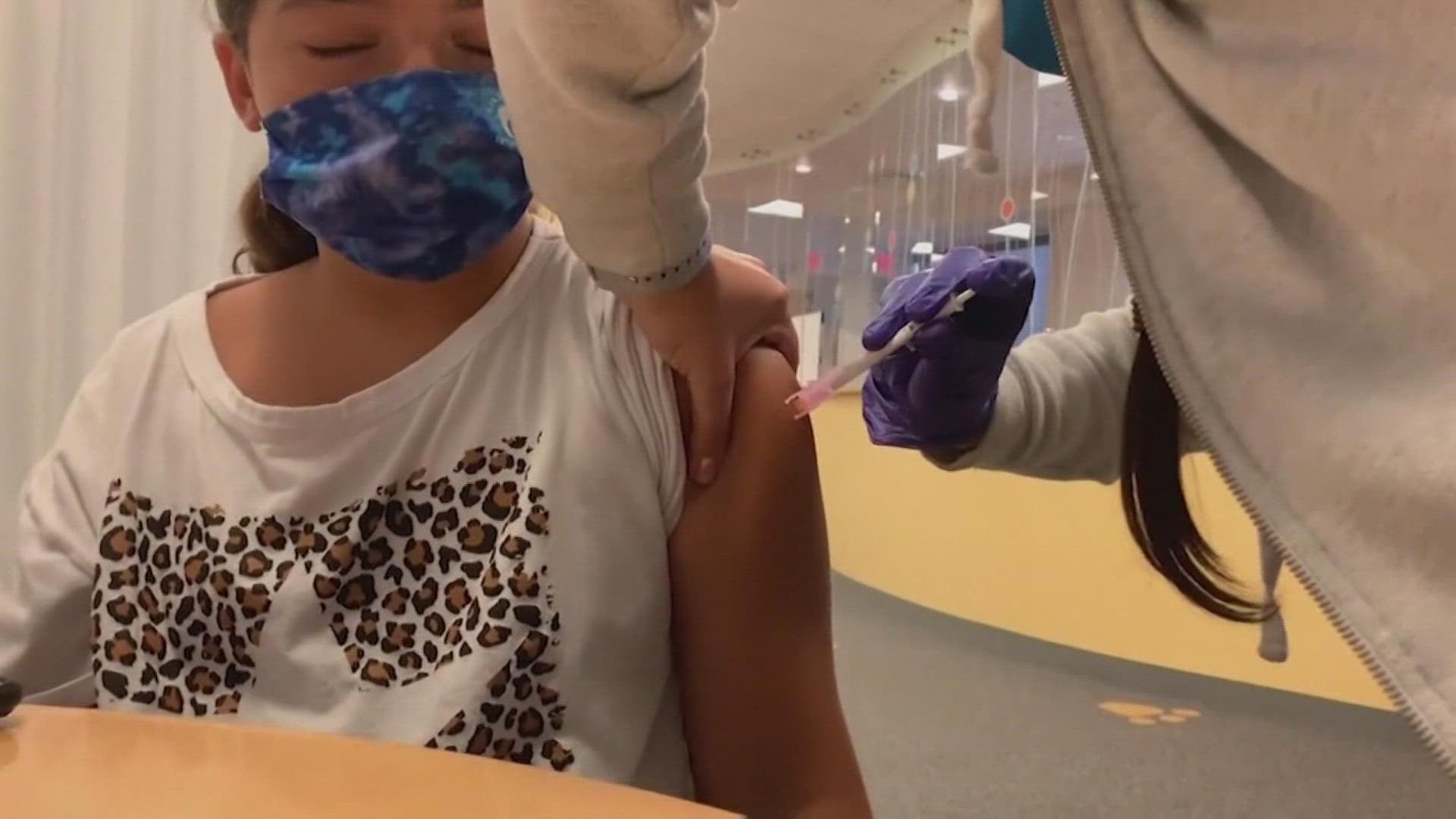 With West Michigan hospitals at a tipping point due to a rise in COVID cases and other illnesses, doctors are urging parents to get their kids vaccinated.