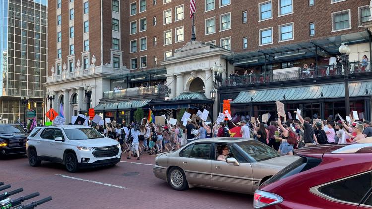More than 100 people march through Downtown Grand Rapids, protesting Supreme Court abortion ruling