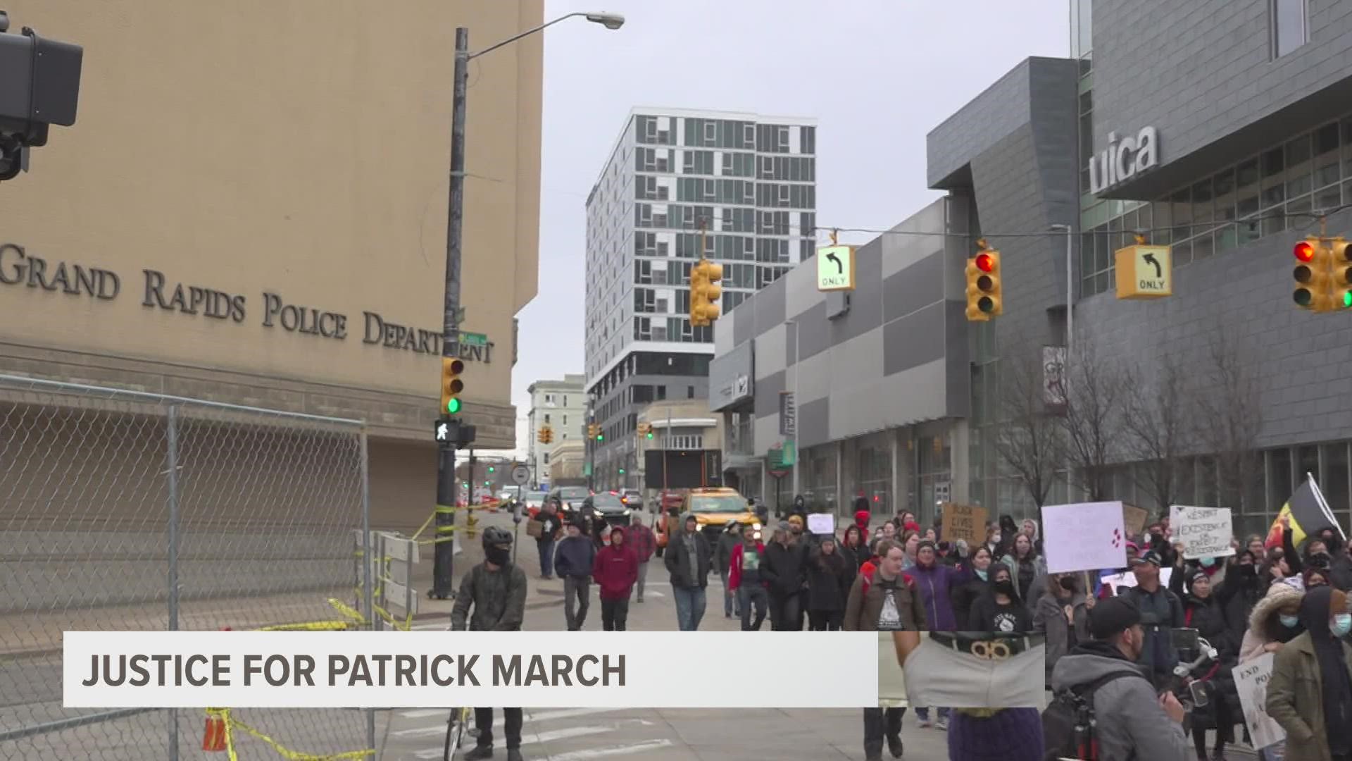 During the rally, the group stopped outside Grand Rapids Police Headquarters multiple times. For about four hours, about 100 marched through the city.