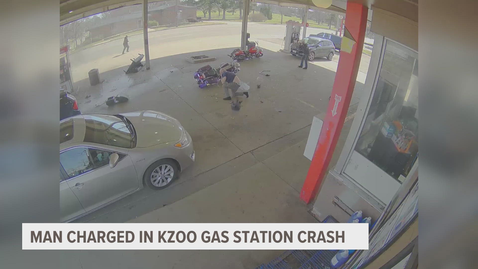 Eric David Johnson was arraigned on four charges after crashing his SUV into a Kalamazoo gas station and injuring seven people in March.
