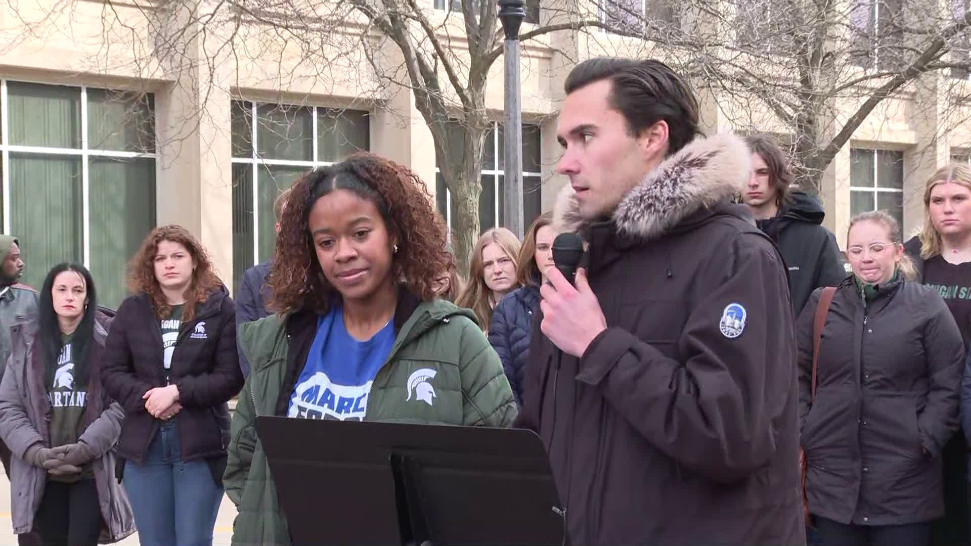 Activists gathered in Lansing Monday morning to call for stricter gun laws a week after the fatal mass shooting at Michigan State University.