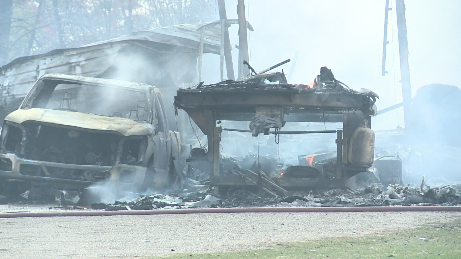 Firefighters said the fire originated at a propane tank in between the house and the garage.