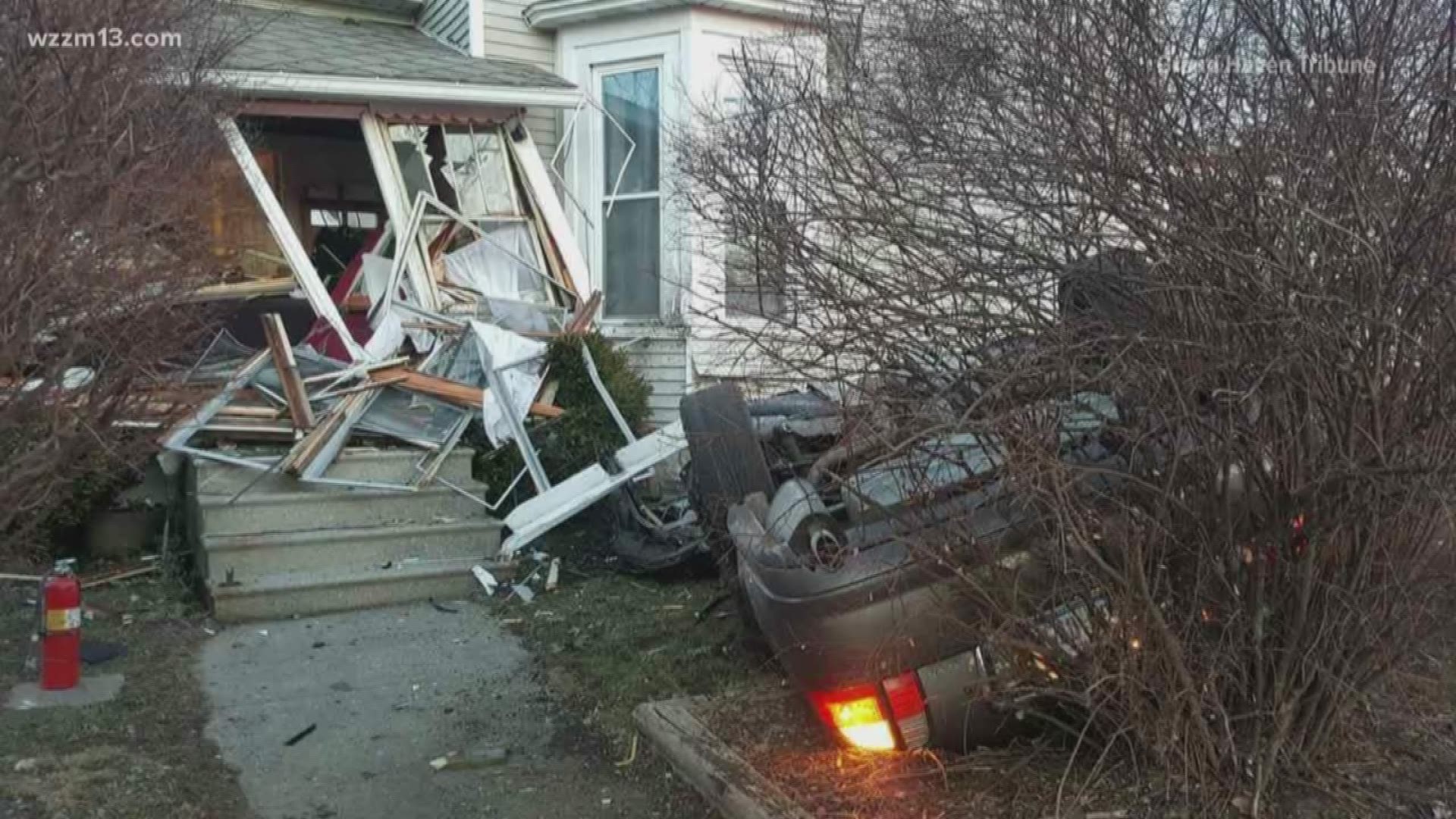 Man injured in Grand Haven crash, porch destroyed