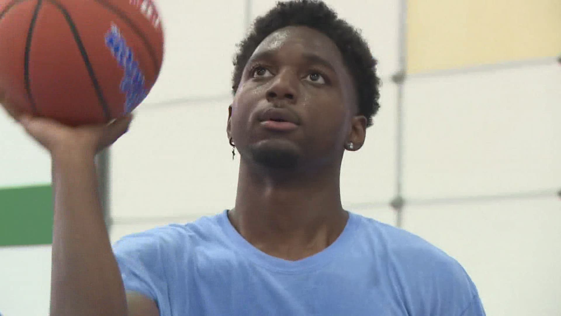 A Wyoming basketball player is taking a different route to chasing his basketball dreams.