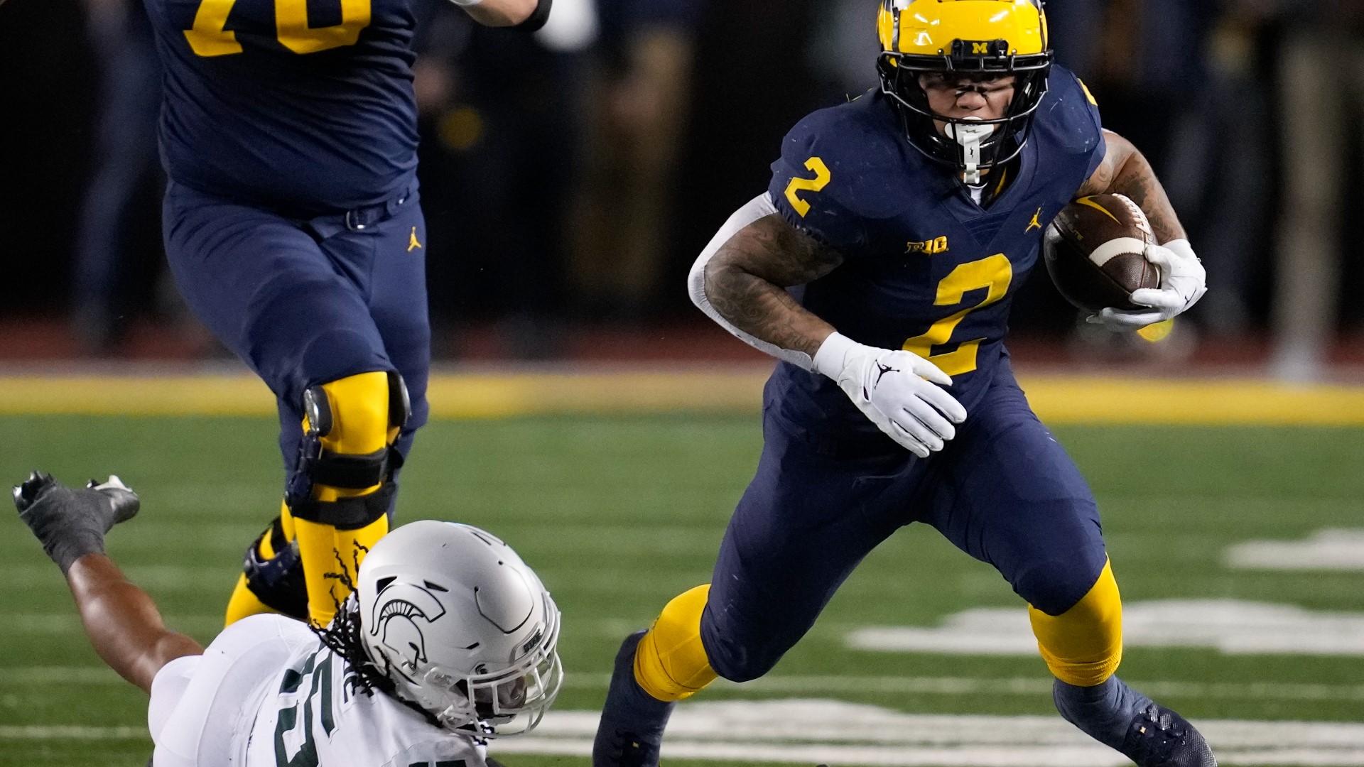 Blake Corum ran for 177 yards and scored twice, and Jake Moody made five field goals to help No. 4 Michigan remain unbeaten with a 29-7 win over Michigan State.
